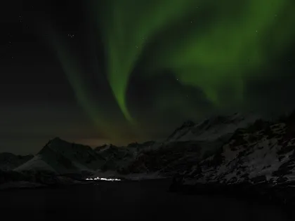 Mabey Ski_Norway_Lyngen Alps_Borealis aurora over Koppangen from Aroya Island_March 2008_Photo by Jean-Marc Pic